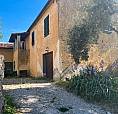 Casa Con Magazzino E Terreni